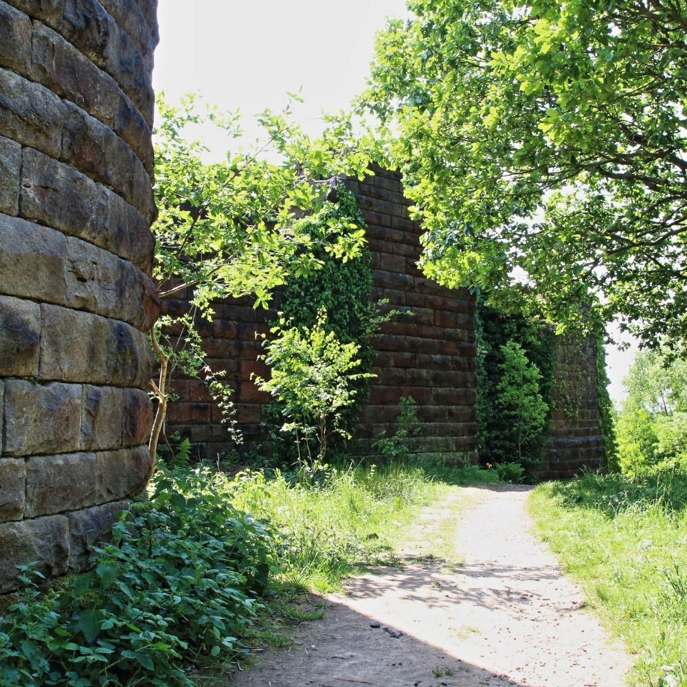 rivington pike roe & co estate agents in horwich close up of stone building and pathway